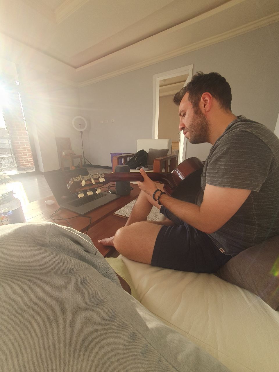 Emre playing guitar